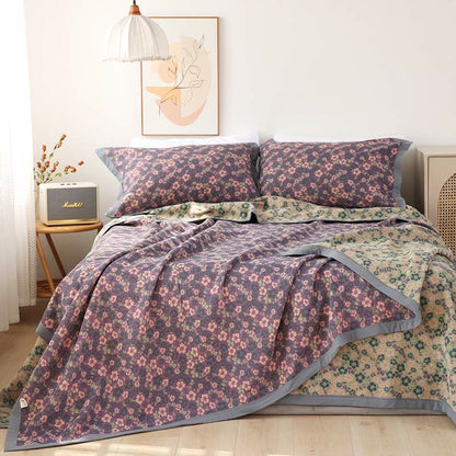 Couette réversible en gaze de coton à motif floral et jacquard