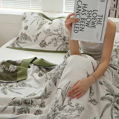 Couette réversible en coton avec fleurs et feuilles pastorales