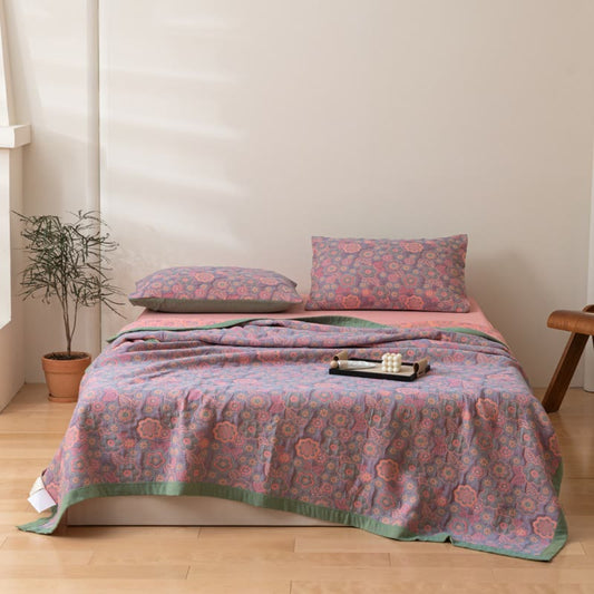 Couette réversible en gaze de coton à motif jacquard floral