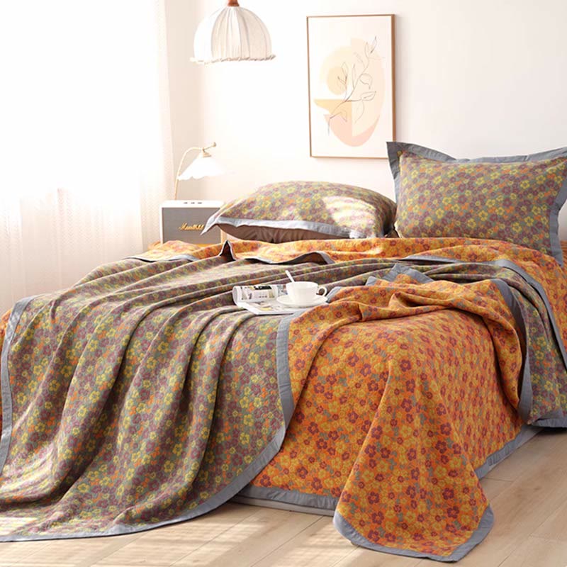Couette réversible en gaze de coton à motif floral et jacquard