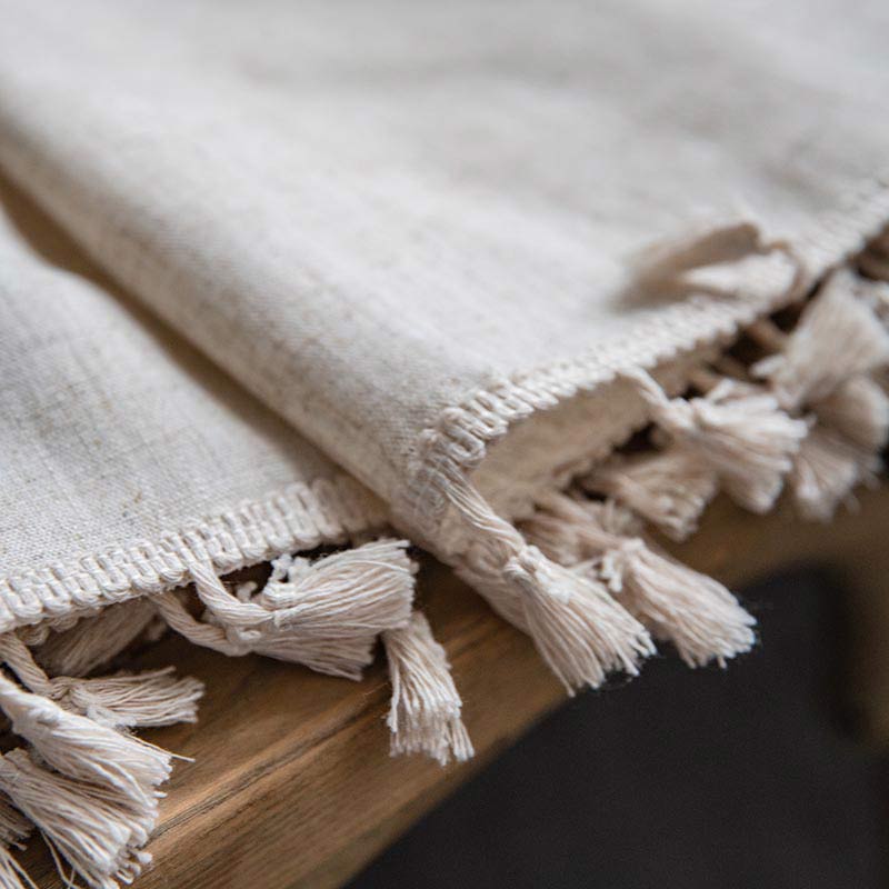 Rideau filtrant la lumière beige à pompons Boho