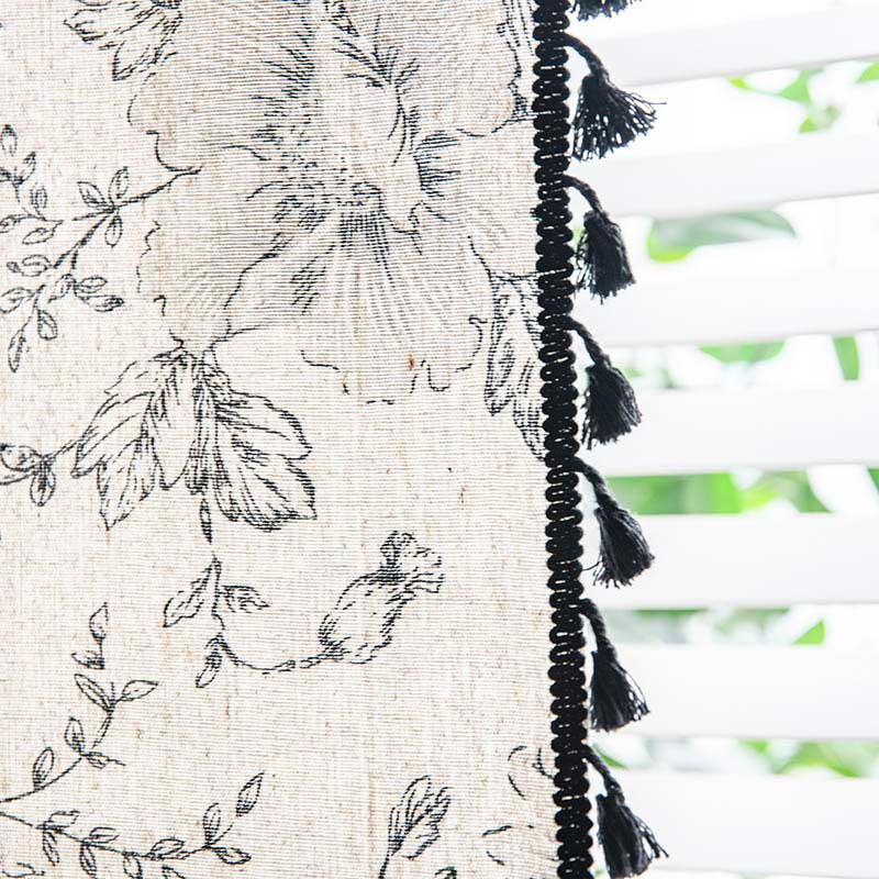 Rideau à fleurs noir avec pompon noir