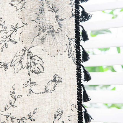 Rideau à fleurs noir avec pompon noir