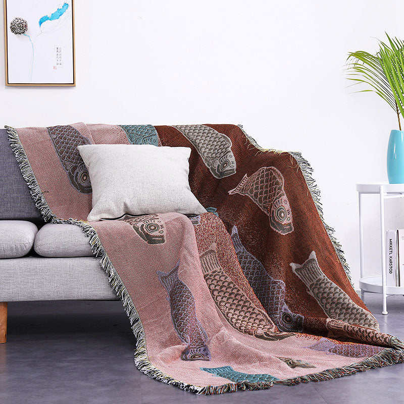 Couverture réversible avec pompons et imprimé koi