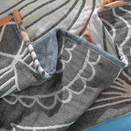 Housse de canapé réversible avec imprimé coquillage