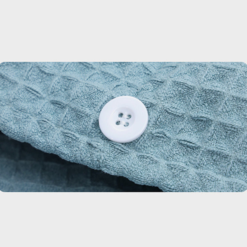 Serviette sèche-cheveux avec motif gaufré et boutons