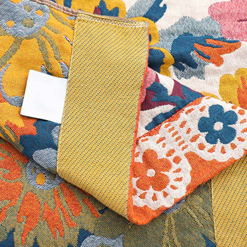 Couette réversible en coton avec des fleurs aux couleurs vives