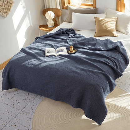 Couette réversible en coton à motif quadrillé uni