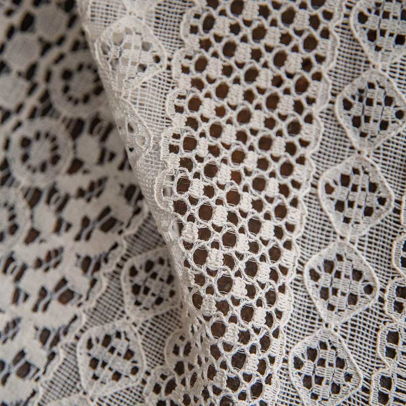 Rideau en coton beige à pompons creux