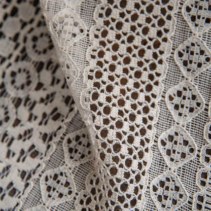 Rideau en coton beige à pompons creux