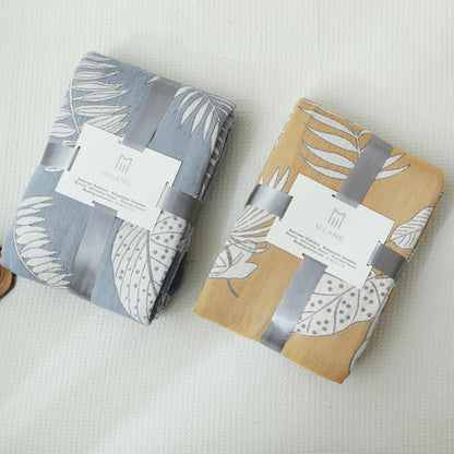 Couverture douce et réversible en gaze de coton à motifs