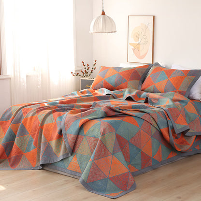 Couette réversible en coton à motif triangulaire