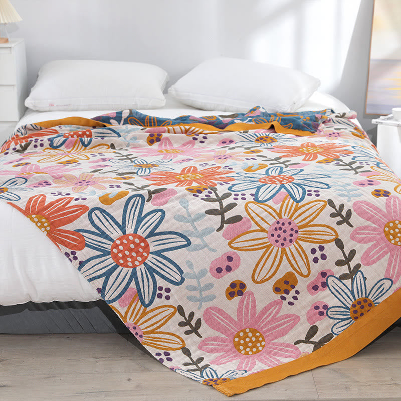 Couette réversible en gaze de coton avec des fleurs enfantines