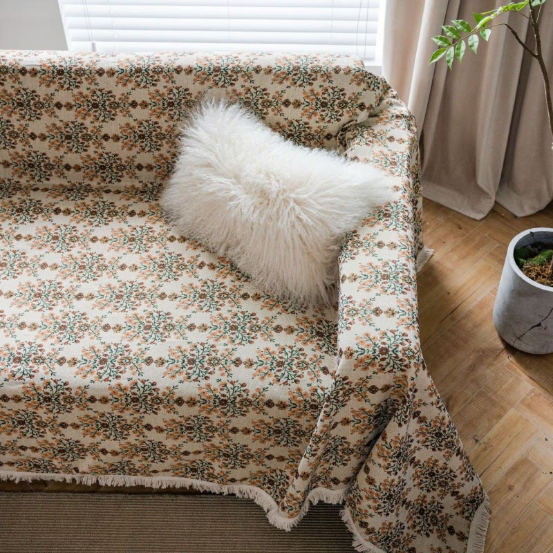 Housse de canapé avec pompon jacquard et motif fleur de prunier