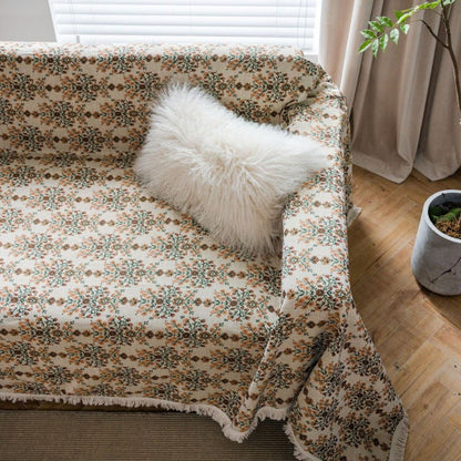 Housse de canapé avec pompon jacquard et motif fleur de prunier