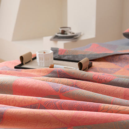 Couette réversible en coton à motif triangulaire