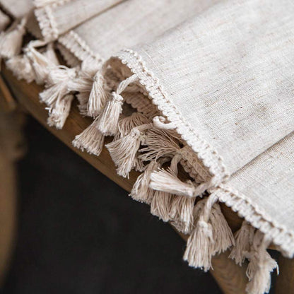 Rideau filtrant la lumière beige à pompons Boho
