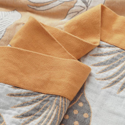 Couverture douce et réversible en gaze de coton à motifs