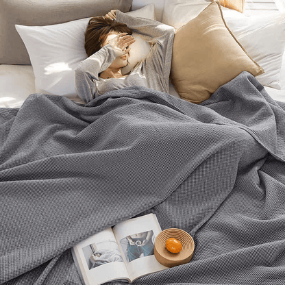 Couette réversible en coton à motif quadrillé uni