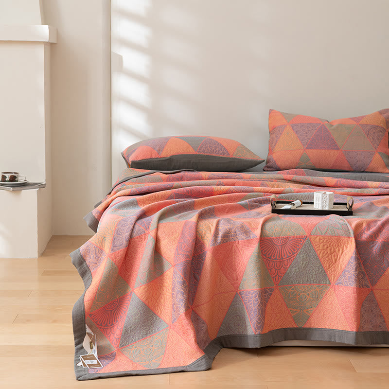 Couette réversible en coton à motif triangulaire