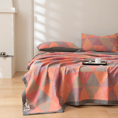 Couette réversible en coton à motif triangulaire