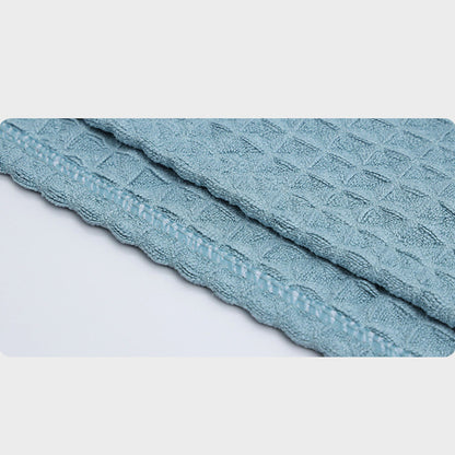Serviette sèche-cheveux avec motif gaufré et boutons