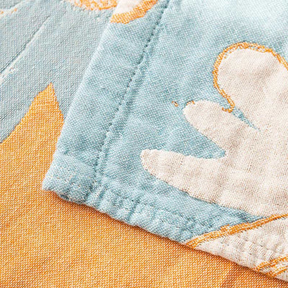 Couverture douce en coton réversible avec imprimé marguerites