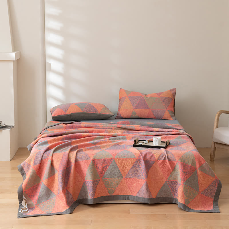 Couette réversible en coton à motif triangulaire