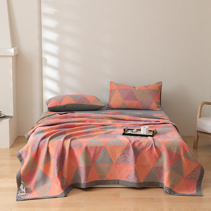 Couette réversible en coton à motif triangulaire