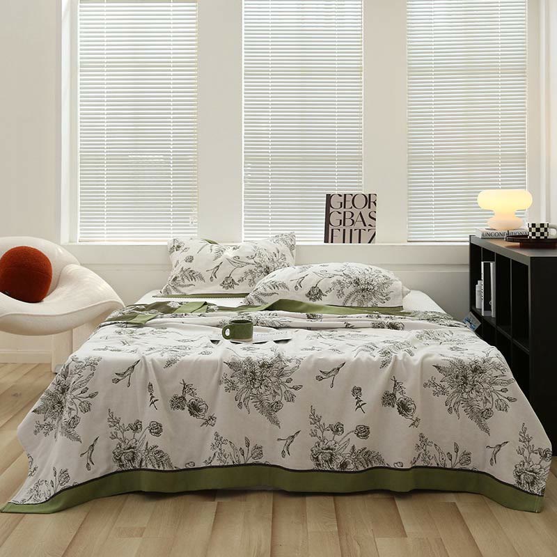 Couette réversible en coton avec fleurs et feuilles pastorales