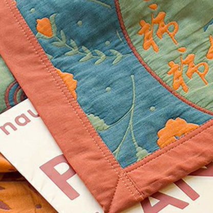 Couette double face en coton avec motif de fleurs de kaki