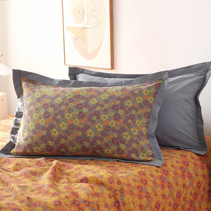 Couette réversible en gaze de coton à motif floral et jacquard