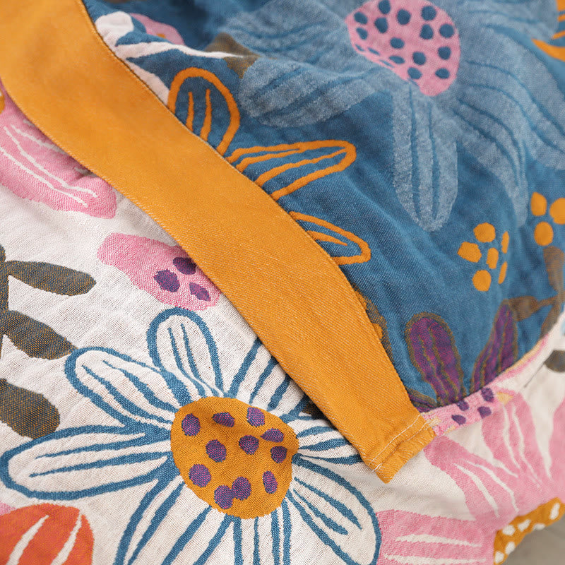Couette réversible en gaze de coton avec des fleurs enfantines