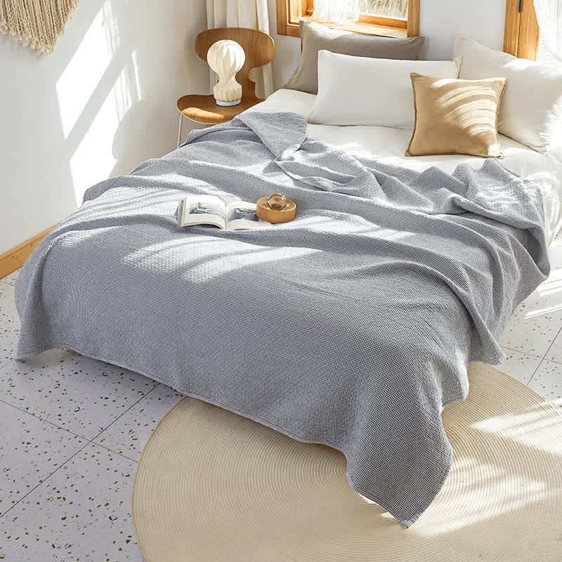 Couette réversible en coton à motif quadrillé uni