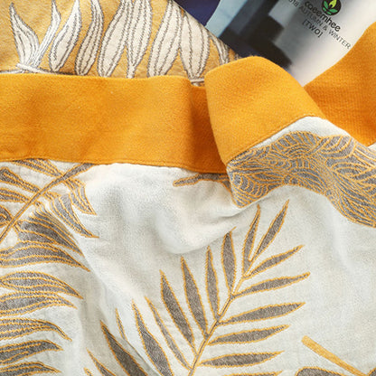 Couverture douce et réversible en gaze de coton à motifs