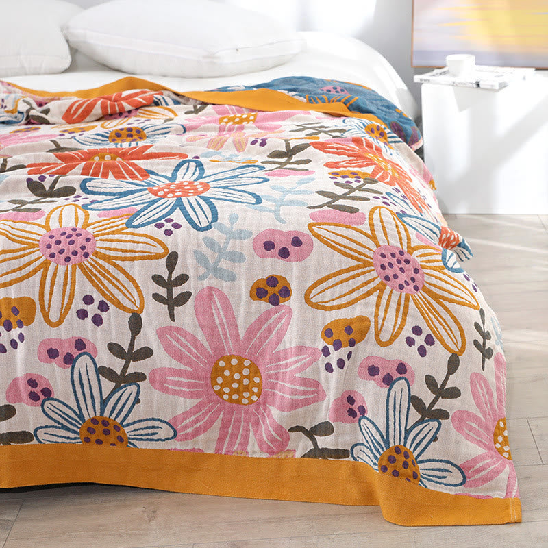 Couette réversible en gaze de coton avec des fleurs enfantines