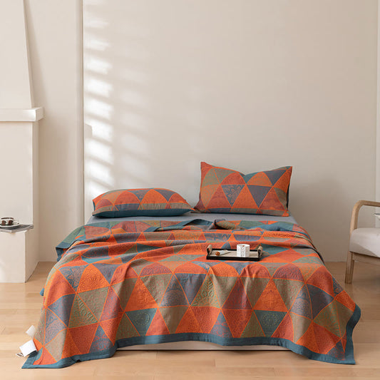 Couette réversible en coton à motif triangulaire