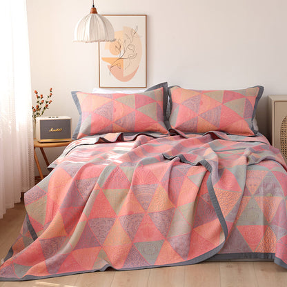 Couette réversible en coton à motif triangulaire