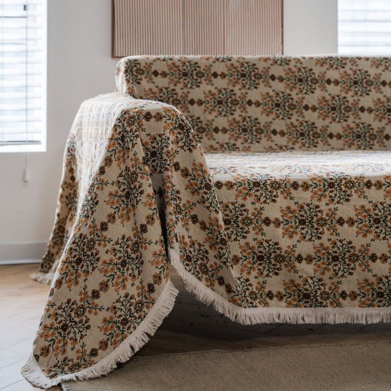 Housse de canapé avec pompon jacquard et motif fleur de prunier