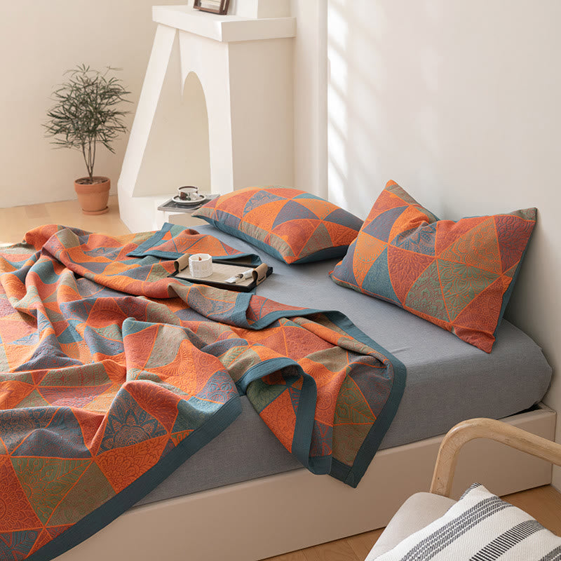 Couette réversible en coton à motif triangulaire