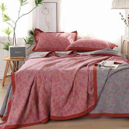 Couette réversible en gaze de coton à motif floral et jacquard