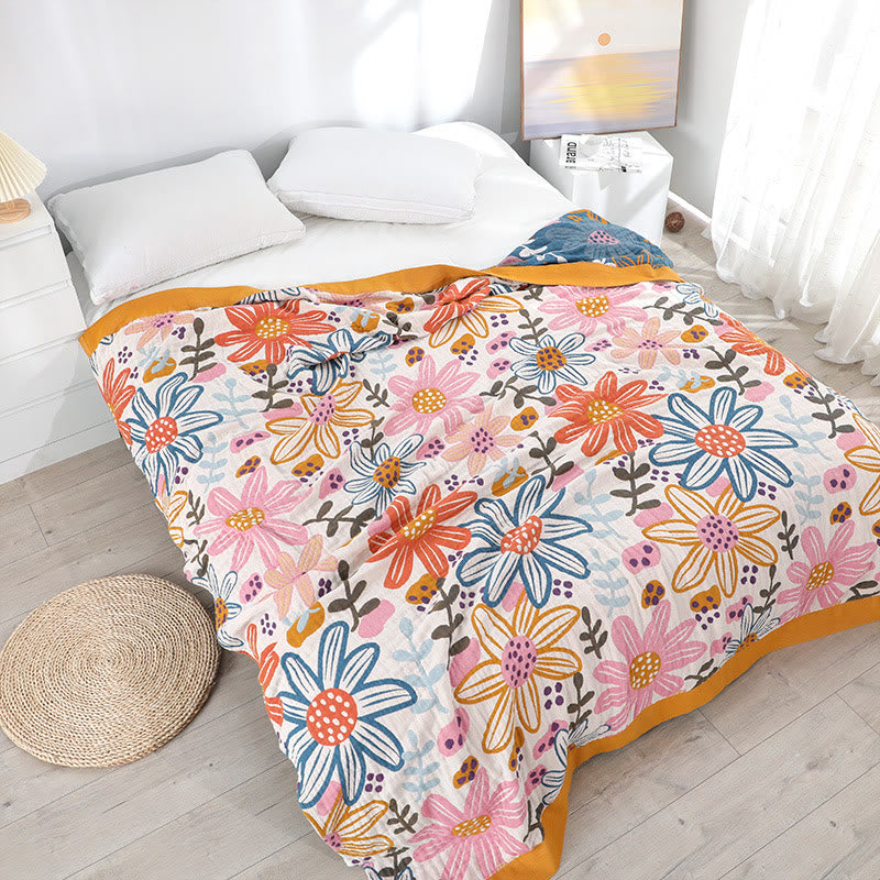 Couette réversible en gaze de coton avec des fleurs enfantines