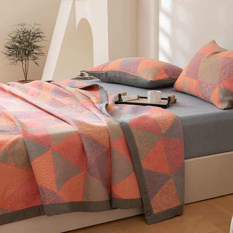 Couette réversible en coton à motif triangulaire