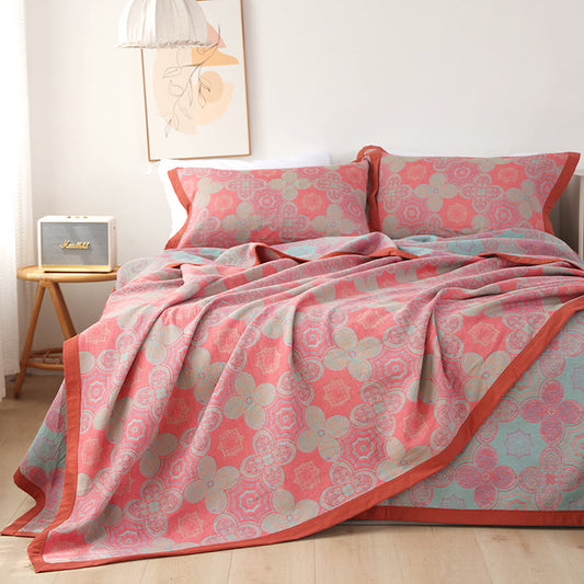 Couette réversible en gaze de coton à motif floral patchwork