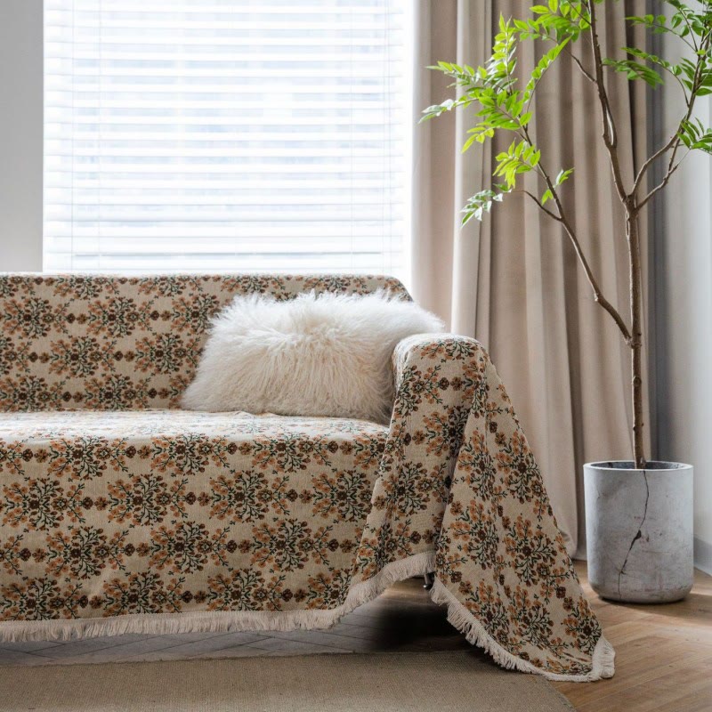 Housse de canapé avec pompon jacquard et motif fleur de prunier