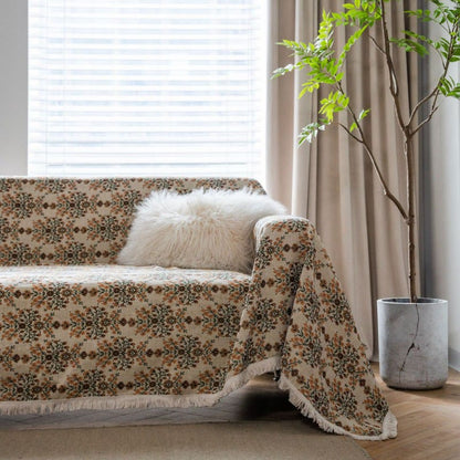 Housse de canapé avec pompon jacquard et motif fleur de prunier