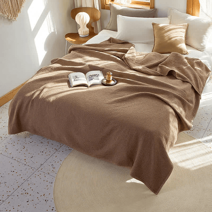 Couette réversible en coton à motif quadrillé uni