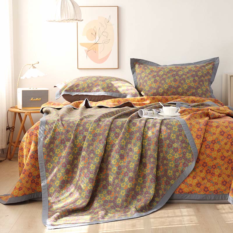 Couette réversible en gaze de coton à motif floral et jacquard