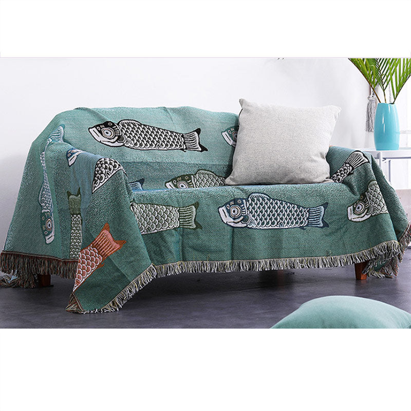 Couverture réversible avec pompons et imprimé koi