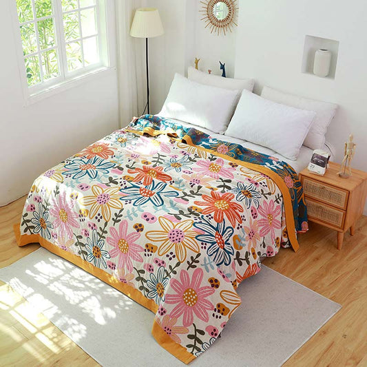 Couette réversible en gaze de coton avec des fleurs enfantines